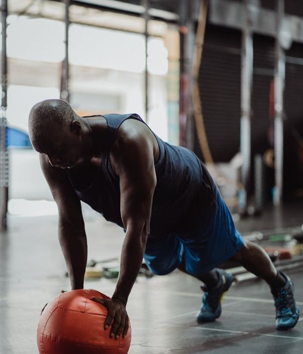 Man performing a powerful and controlled strength exercise.